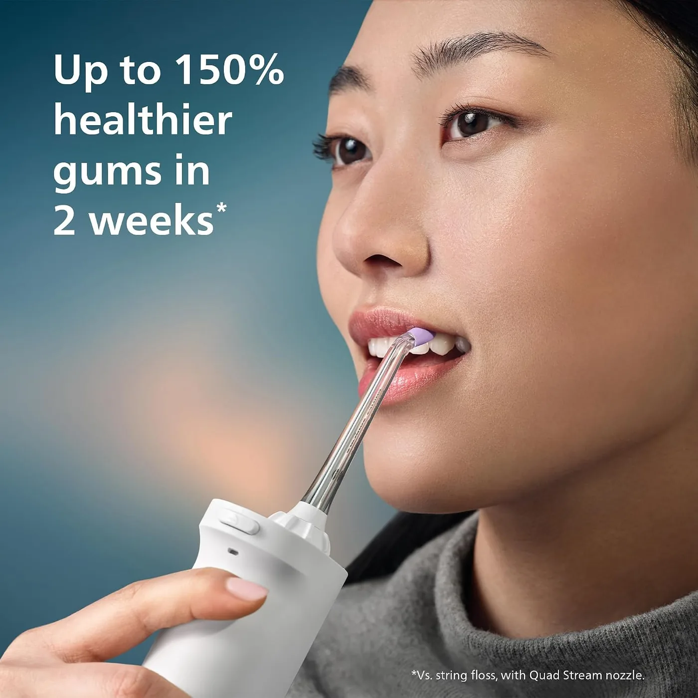 Person using the Philips Sonicare Power Flosser 3000 between their teeth