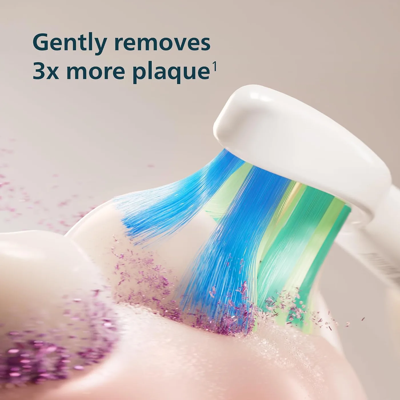 Manufacturer graphic showing plaque being removed from a tooth by the Philips Sonicare 2100 brush head