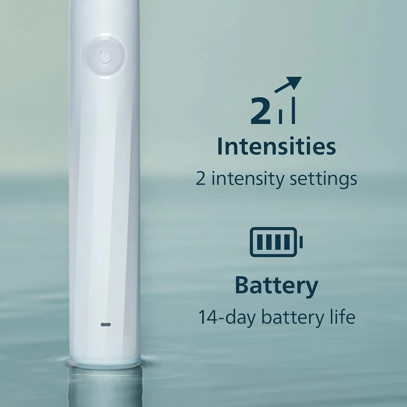 Close-up of the Philips Sonicare 2100 handle showing the two intensity settings and the battery indicator