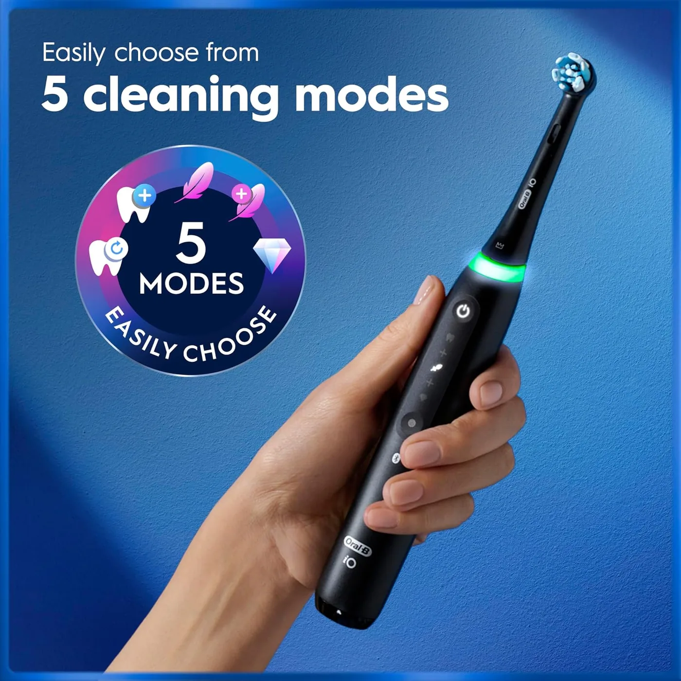 Close-up of the Oral-B iO5 gum pressure sensor ring lighting up in three colours for too soft, correct pressure and too hard